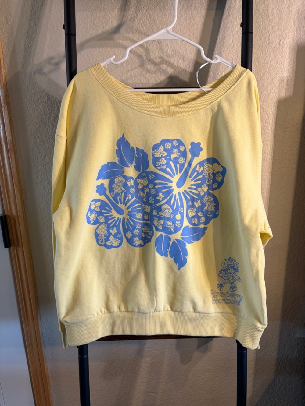Off-the-Shoulder Yellow Sweater with Blue Floral Print